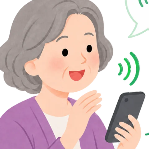 スマートフォンに向かって話す年配の女性